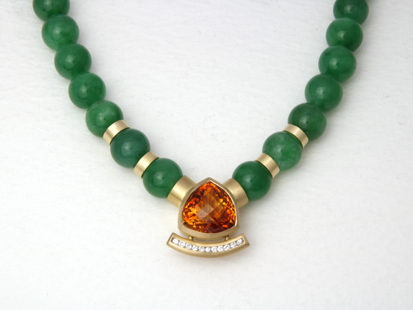 Commissioned necklace with green beads a Central Citrine stone and a channel set diamond feature